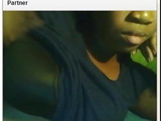 Hawt ebony hotty is playing with her large boob on chat